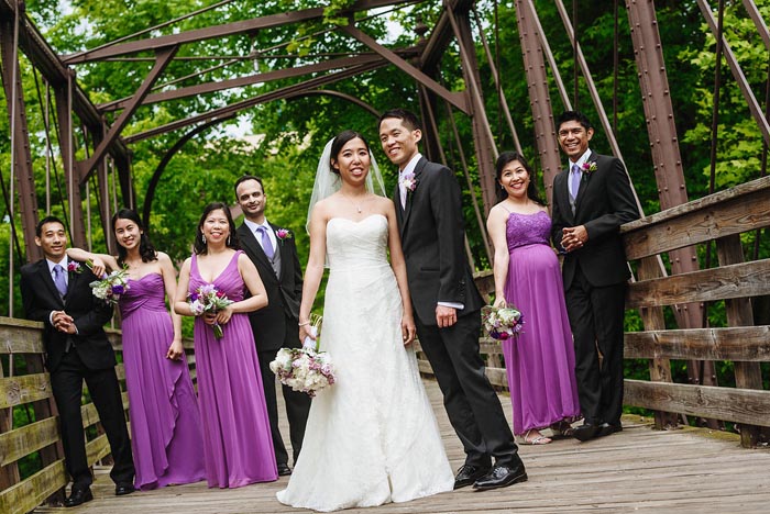 Newlyweds Melinda and Dustin Chang with their wedding party at Phoenixville Foundry.