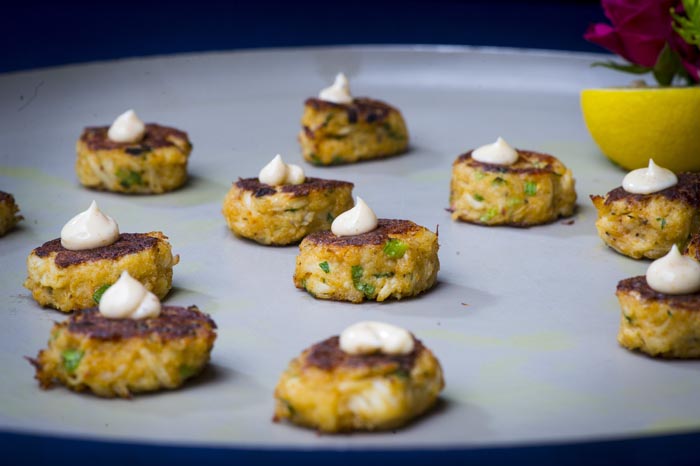 Mini Maryland Lump Crab Cakes served with an Old Bay Remoulade